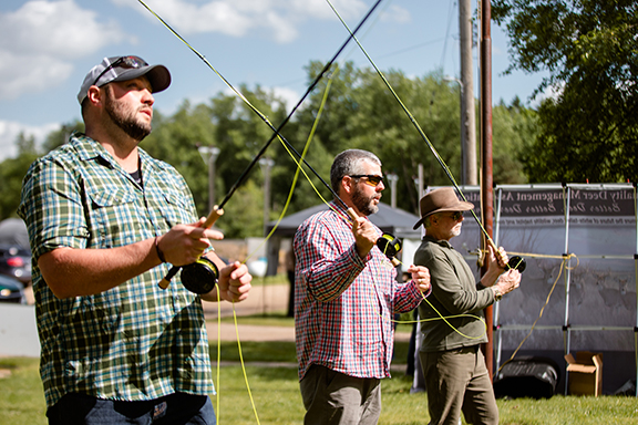 Michigan Trout Unlimited Executive Director Bryan Burroughs teaches fly casting.