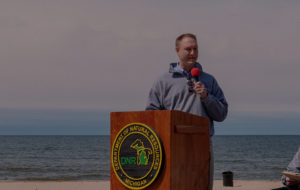 The DNR director speaks at a State Parks celebration.